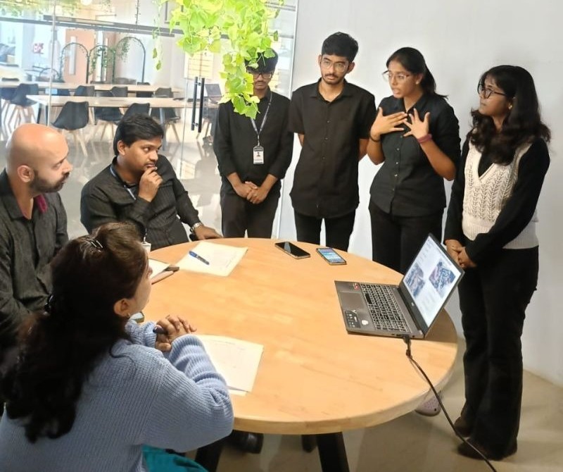 Students presenting their project to reviewers