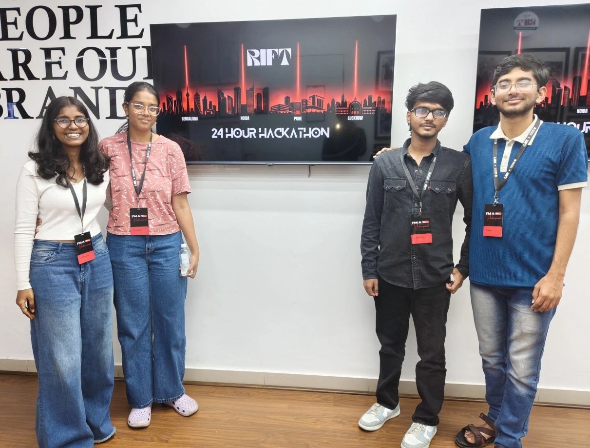 Participants gathered in front of the event display
